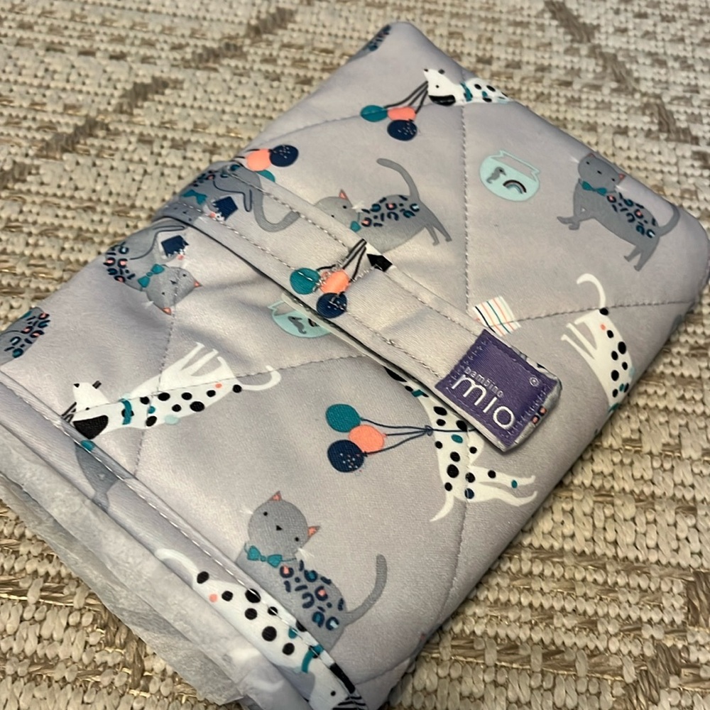 Brand new Bambino Mio Diaper Pad for travel/diaper bag. Dogs and cats pattern.